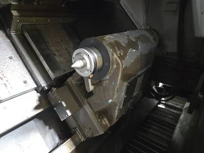 Hyundai SKT-400C F21ITB CNC Lathe w/ Tailstock and Indexer, 10 Slot Turret, LNS Conveyor, 3-Jaw
