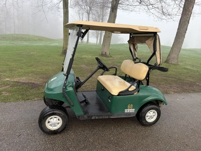 (1) 2017 E-Z-Go golf cart with a Kawasaki gas engine, model 625111G01, includes canopy, ball cover, ...