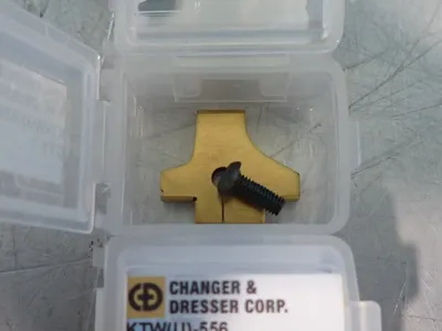 NEW CHANGER & DRESSER CORP KTW(U)556