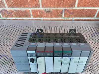 USED ALLEN BRADLEY SLC 500 1746-P1 PROCESSOR UNIT W/ 1747-L532, 1746-NT4 MODULES