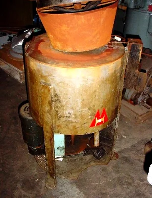Mossberg-Hubbard 1225 carrier type oil extractor.