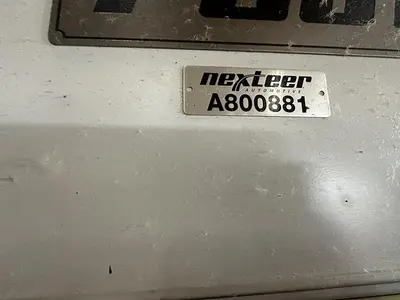 Used FUJI ANW 35 TWIN TURRET CNC LATHE, TAIL STOCK WITH ROBOT LOAD/UNLOAD AND STOCKER TABLES CNC Lathes | Harbor Machinery Inc. #1283396