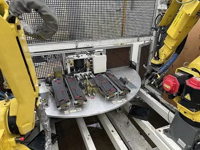 Used 2008 FANUC M10IA DUAL ARM ROBOTIC FOAM CELL WITH A/B SIDED INDEX TABE/ COULD CONVERT TO WELD CELL Robotic Welding Cells | Harbor Machinery Inc. #1283347