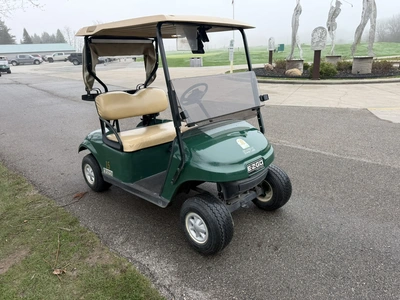 (1) 2015 E-Z-Go golf cart with a Kawasaki gas engine, includes Club canopy, ball washer, fold-down w...