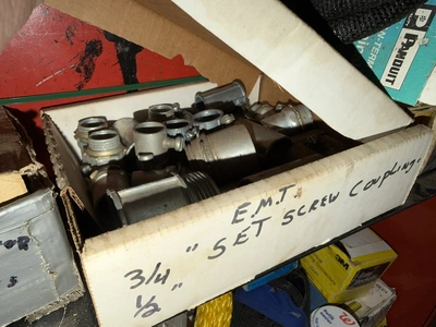 (2) Auto Call single door storage cabinets filled with assorted electrical items, including Push Mat...