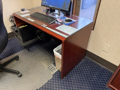 Contents of office furniture, includes (1) wood desk with glass top, 71" x 36", (1) wood credenza wi...