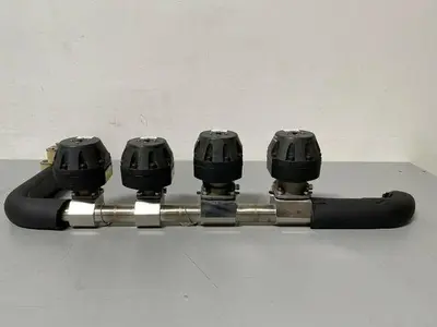 USED 2 ITT 1" & 2 ITT 1/2" 60 PSI VALVES ON MANIFOLD W/ 1/2" & 1" SANITARY FITTINGS