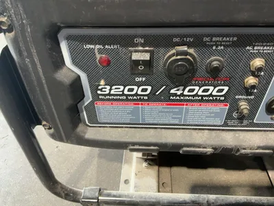 USED PREDATOR 4000 WATT MAX GAS GENERATOR WITH WHEEL KIT