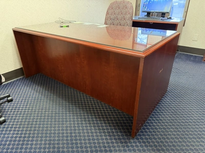 Contents of office furniture, includes (1) wood desk with glass top, 71" x 36", (1) wood credenza wi...