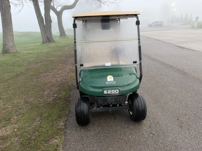 (1) 2015 E-Z-Go golf cart with a Kawasaki gas engine, includes canopy, ball cover, club cover, fold-...