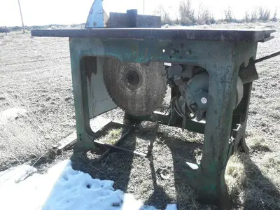 USED METAL TABLE SAW -