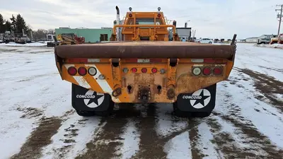 USED 2000 GMC C8500 TANDEM AXLE BED TRUCK