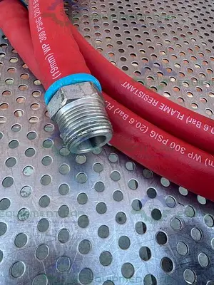 USED SWAGELOK PUSH ON 124" FLAME RESISTANT HOSE 3/4” 300PSIG W/ QUICK RELEASE FITTING