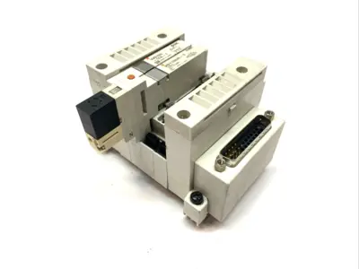 USED SMC PLUG-IN MANIFOLD BASE 4-STATION