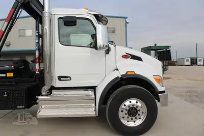 New | in-Stock 2027 PETERBILT 548 Rolloff Trucks Texas US | Roll Off Truck World #1492000