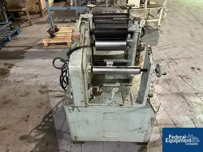 USED NRM 12" NRM Three Roll Sheet Stack
