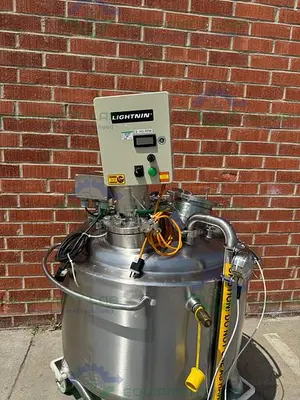 USED PRECISION 250 LITER STAINLESS STEEL JACKETED REACTOR 45 PSI W/ LIGHTNIN MIXER.