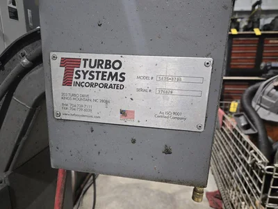 Hyundai HI-V50D VMC w/ 30-Slot ATC, Conveyor, (2) Kurt Vise, Fanuc Oi-MC Controller