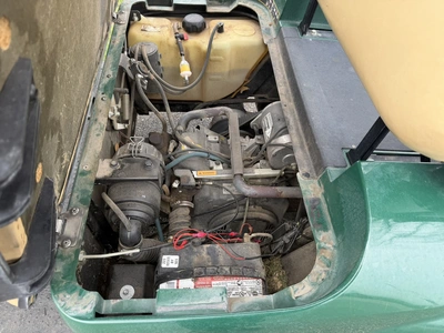 (1) 2015 E-Z-Go golf cart with a Kawasaki gas engine, does not include Club canopy, includes ball wa...
