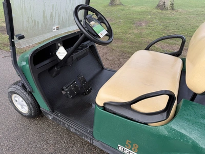 (1) 2017 E-Z-Go golf cart with a Kawasaki gas engine, model 625111G01, includes canopy, ball cover, ...