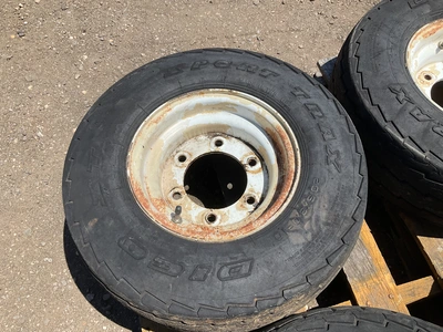 (4) 20.5x8.0-10 tires on steel 6-bolt wheels, used