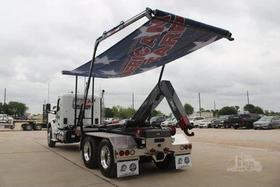 Used 2027 PETERBILT 548 Hooklifts & Roll-Offs Texas US | Roll Off Truck World #1491992