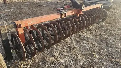 USED STERLING 12' COIL TYPE PLOW PACKER WITH GOOSENECK HITCH