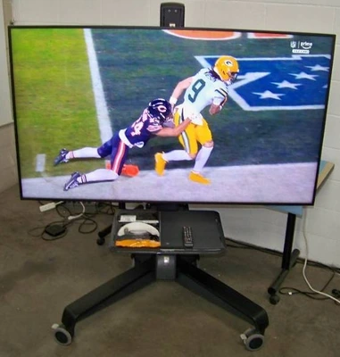 65" Samsung QB65R HDR 4K UHD (Ultra-High Def) Commercial Smart LED Display on Ergotron Neo-Flex Heavy-Duty Rolling TV Cart with Adjustable Shelf and Rotating TV Mount