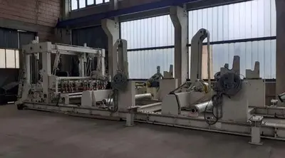 USED 2001 TOSCHI TWO DRUM TISSUE SLITTER REWINDER