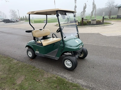 (1) 2015 E-Z-Go golf cart with a Kawasaki gas engine, does not include Club canopy, includes ball wa...