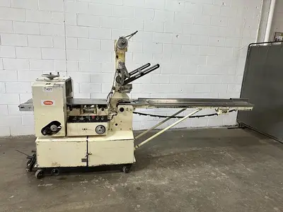 USED DOBOY PACKAGING MACHINERY INC MUSTANG