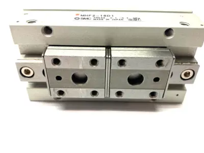 USED SMC LOW-PROFILE PNEUMATIC GRIPPER, 2-FINGER, 16MM STROKE PER JAW