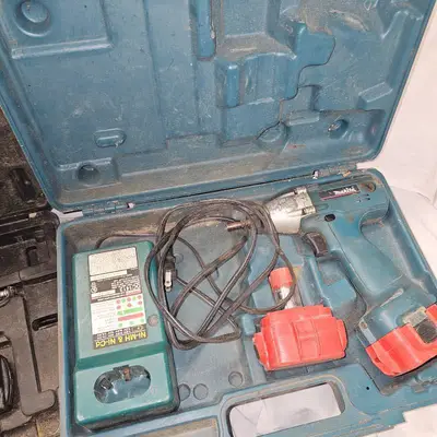 Makita Impact Driver Kit, 2 Batteries, charger and Bostich Air Crown Stapler