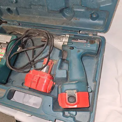 Makita Impact Driver Kit, 2 Batteries, charger and Bostich Air Crown Stapler