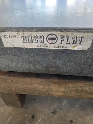 48" X 72" X 10" MICRO-FLAT GRANITE SURFACE PLATE W/ STARRETT BASE. STOCK # 1170823.