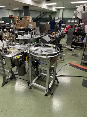 Quadrel model Moduline pressure sensitive wraparound labeler