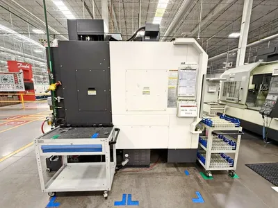 2018 OKUMA GENOS M560-V Vertical Machining Centers | CNCsurplus (5)