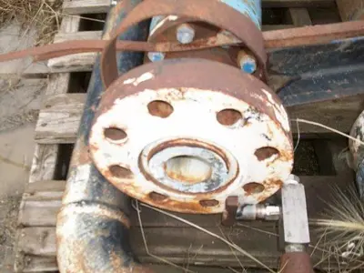 USED NIXCO 2" INLINE FLOW THRU PULSATION DAMPENER / ACCUMULATOR