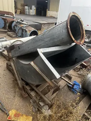 Air conveying scrap system with 100's of feet of piping