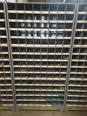 2 stacks of standard nuts, bolts, washers. 1 stack of metric nuts, bolts, washers. Comes with storag...