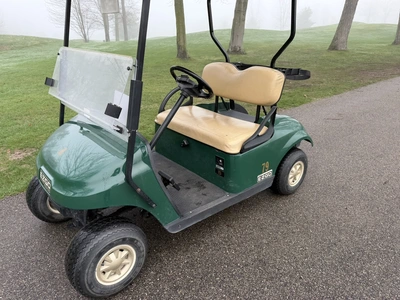(1) 2014 E-Z-Go golf cart with a Kawasaki gas engine, does not include Club canopy, ball carrier, fo...