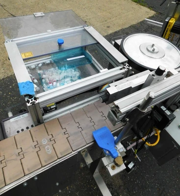 USED NEWMAN WRAP AROUND LABELER NV II