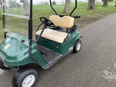 (1) 2015 E-Z-Go golf cart with a Kawasaki gas engine, does not include Club canopy, includes ball wa...