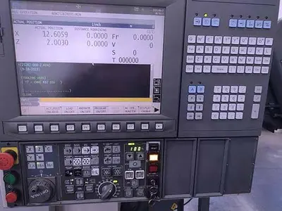 USED 2012 OKUMA GENOS L400-E