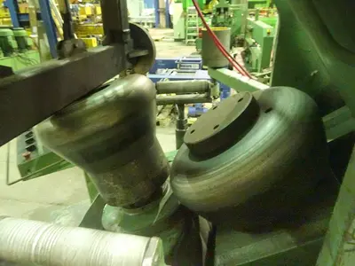 USED HAEUSLER FLANGING MACHINE