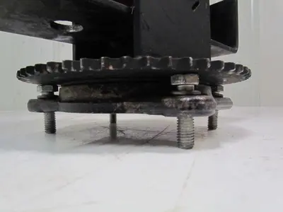 08300-11-24 1" bore caster wheel 9-7/8" OD w/steering sprocket and bracket