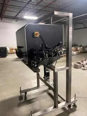 A Packaging Systems Inline Capper