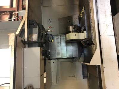 USED OKUMA MILLAC 1052V