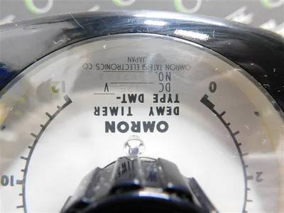 Omron DMT- Demy Timer 125VDC 0-12 minutes Used