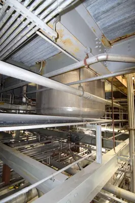 Mason Steel Tank, Approximately 2,500 Gallons, Stainless Steel, Vertical.